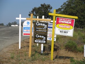 Homes for sale signs 300x225 Canadian Real Estate Bounce back Seen In Rising Sales And Housing Prices In 2009